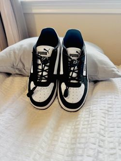 Kid's Puma Caven 2.0, no tie shoe strings, size 1