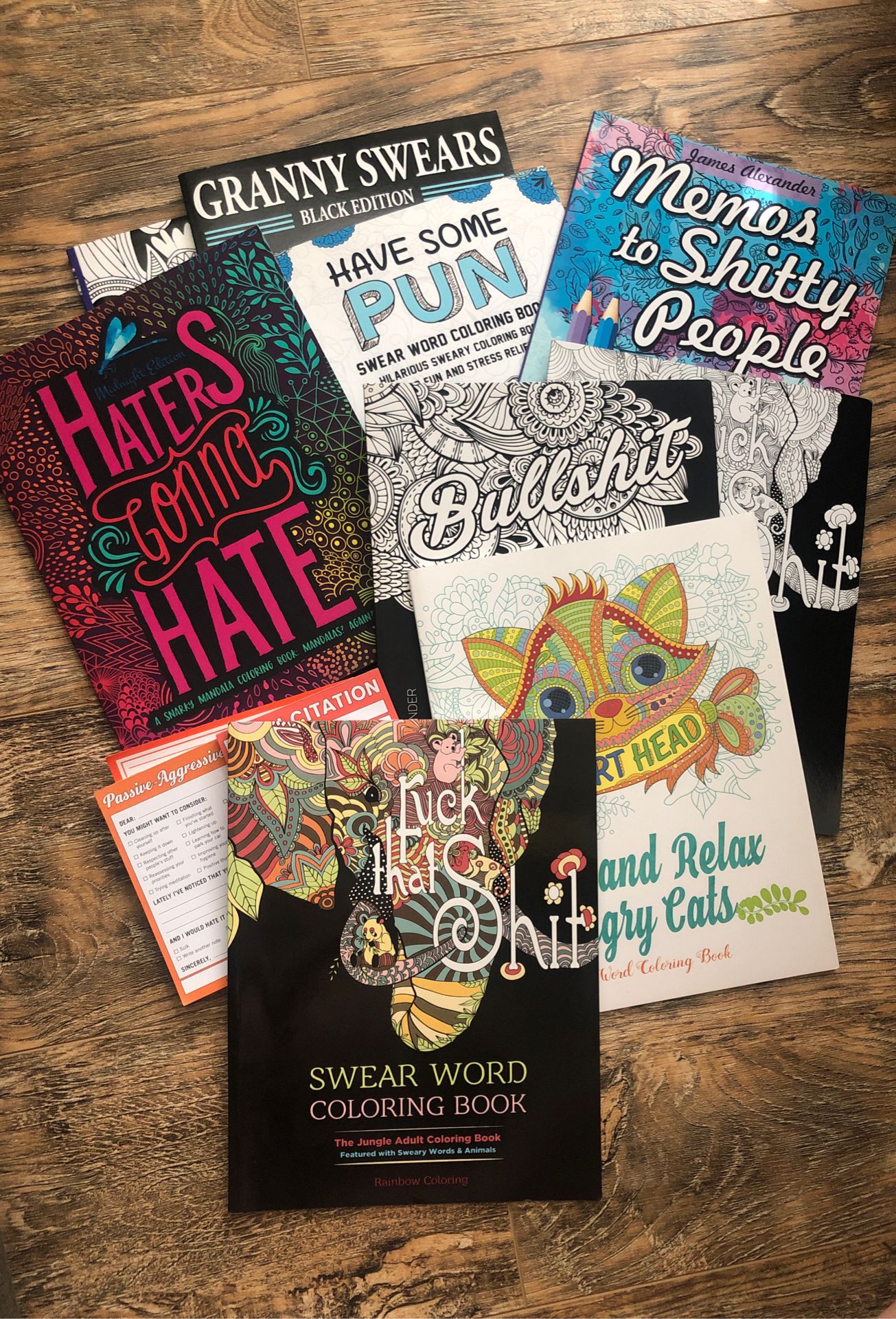 Brand new adult coloring books and knock knock note pads