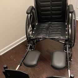 Folding Wheelchair With Elevating Leg Rests