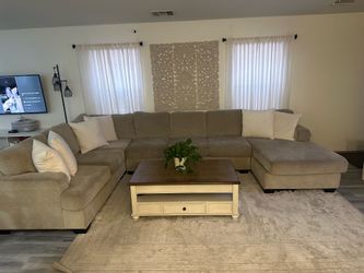 Taupe colored sofa from Ashley’s