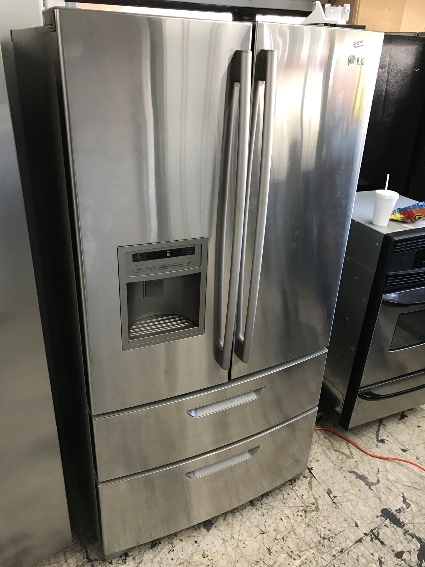 LG four door fridge/freezer stainless steel like new