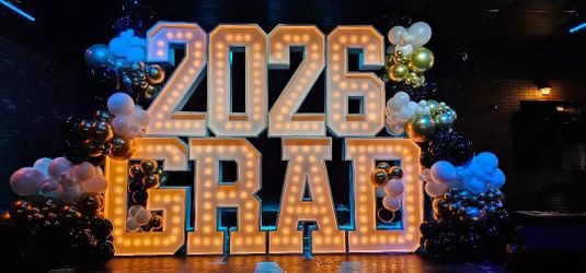 Marquee light up GRAD 2026 letters