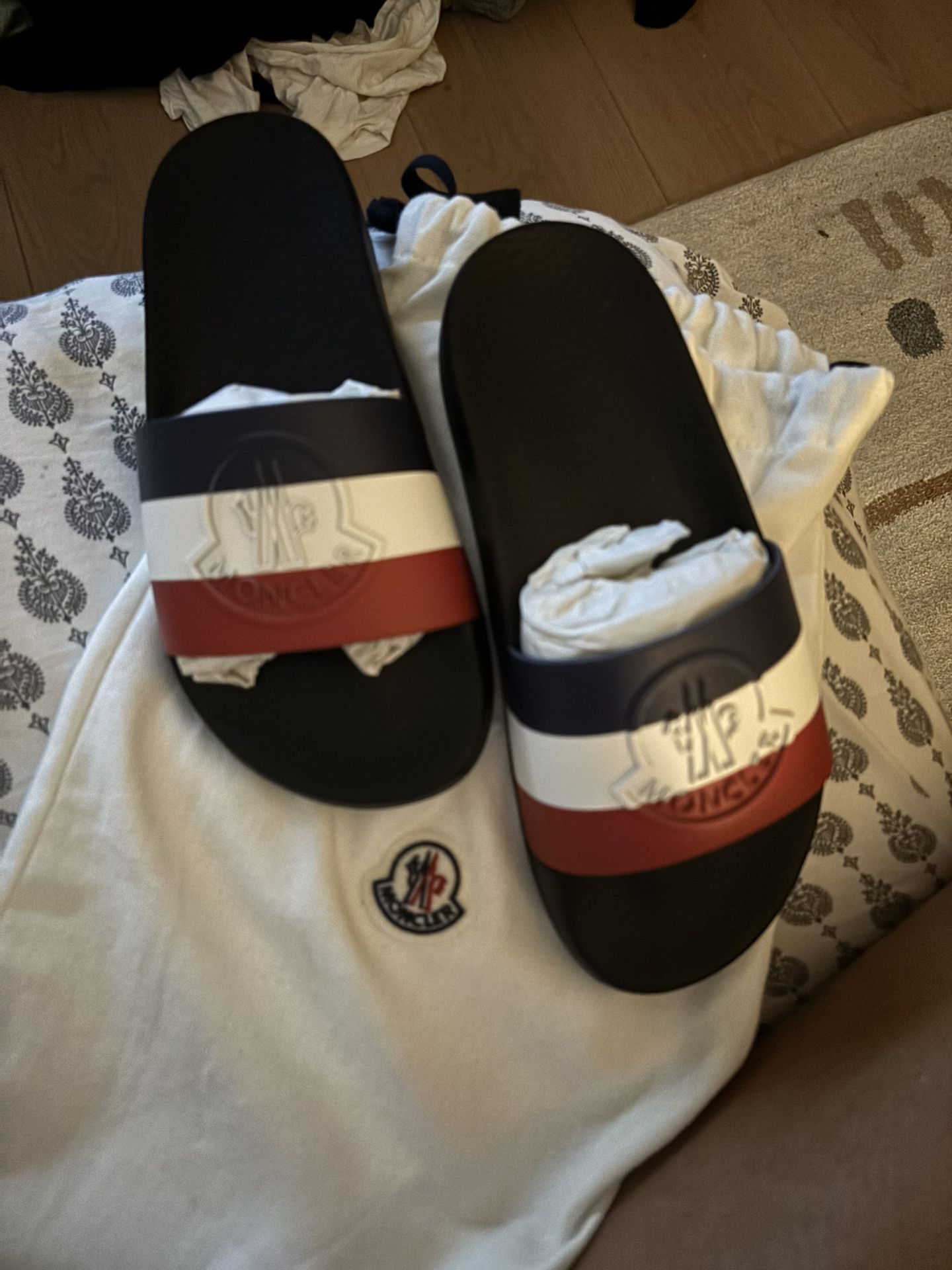 LOW PRICE MOVING- $440 + TAX RETAIL WOMENS 6 MONCLER SLIDES