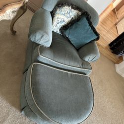 Two Identical Lounge Chair And Ottoman 