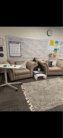 Two Lounging Beige Large Arm Chairs