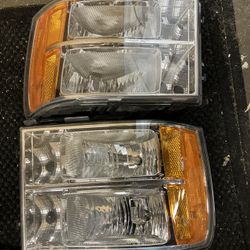 2012 GMC Sierra Headlights