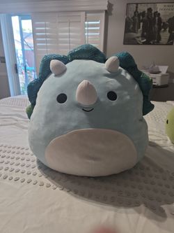 Mailk the blue triceratops