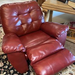 Red leather couch, chair, and loveseat