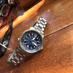 Eco Drive.  No Need For Battery. Holds Charge By Light. 