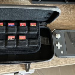 Nintendo Switch Lite W/7 Games