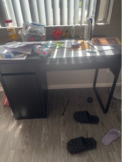 Heavy duty study table with a big and a small drawer a small cabinet