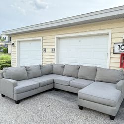 Modern gray sectional couch, recently cleaned and in good condition