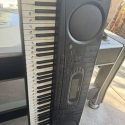 Electric musical keyboard 