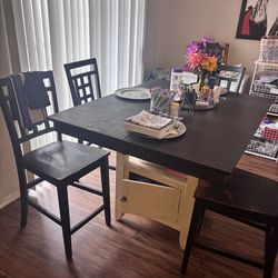 Four piece dining room table