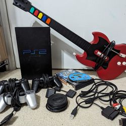 PS2 Gaming Bundle, 3 Controllers, Guitar, 7 Games