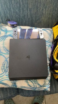 Nintendo switch alerSony PlayStation 4 Slim Console plus Nintendo switch OLED