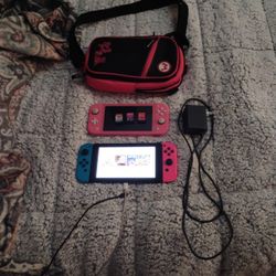 Nintendo Switch And Switch Lite With Games And Bag