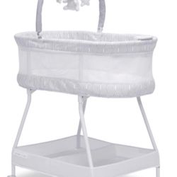 Delta Children Curve Bassinet, White/Grey  Open box item  INVENTORY NUMBER: 101(contact info removed)