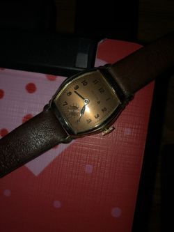 Alton mans keeps good time stainless steel back