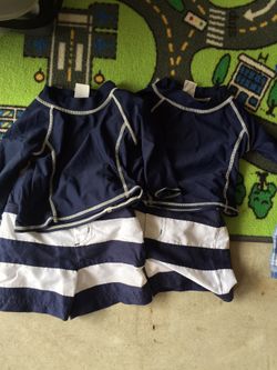 Boys clothing- twins- 12 months- $3 each short set & swim suit set