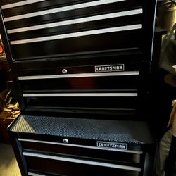 Three Tier Black Craftsman Tool Box with some tools