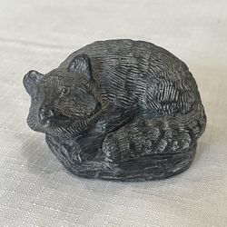 Nuvuk carved soapstone raccoon figurine, authentic Canadian Inuit art.
