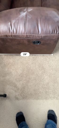 Brown pleather love seat