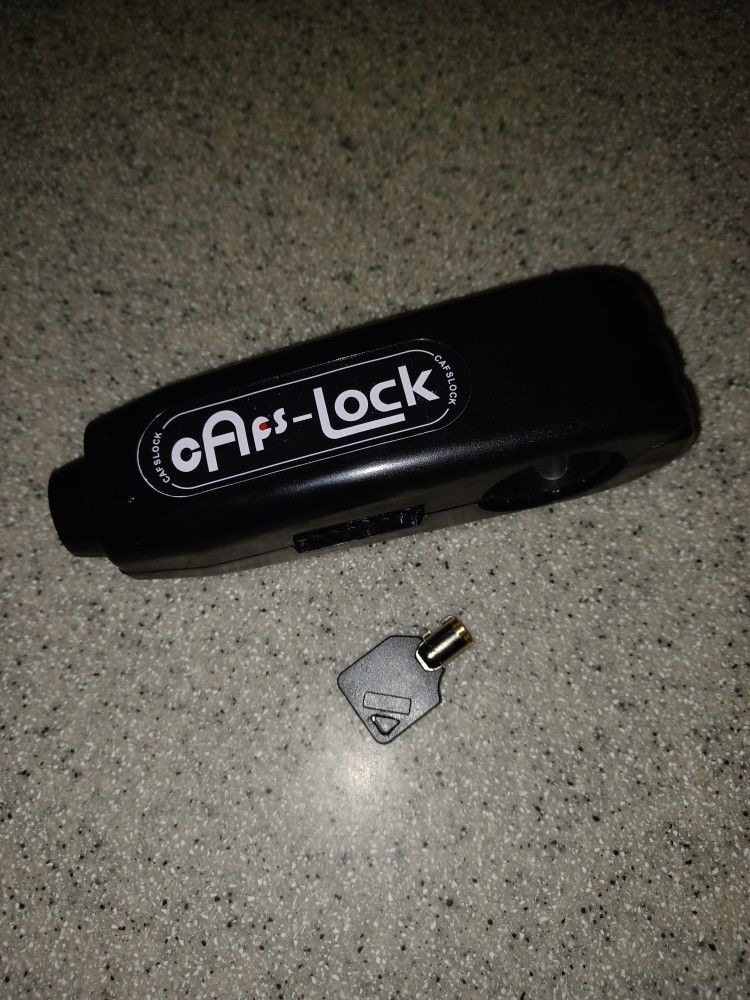 Motorcycle Front brake lever lock. 2 Keys. 2 Avail.