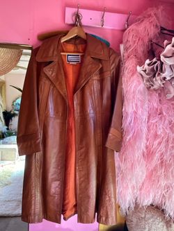 Vintage brown/orange womens leather trenchcoat
