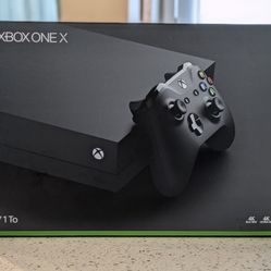 XBOX ONE X 1TB system and games