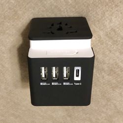 Global Travel Power Adapter with USB Charger Ports (USB C and A for use with Apple iPhone  or Samsung phone, tablet, etc.)