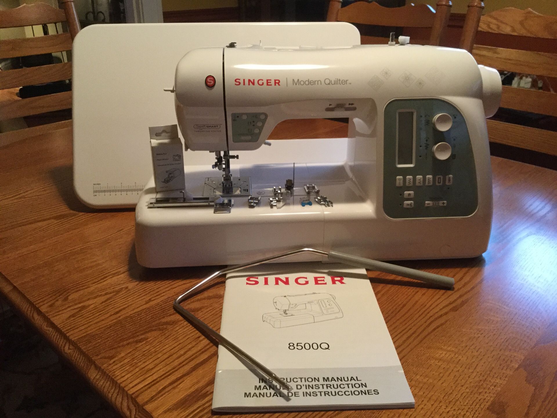 Singer 8500Q Modern Quilter with 215 stitches.