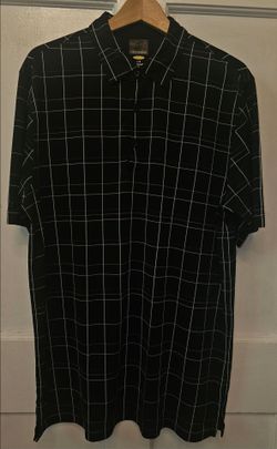 Greg Norman Polo Shirt Mens Black Plaid Short Sleeve Casual Golf Size Large 
Excellent condition 
Like new 
Super clean 
No rips or stains 
Pls see al