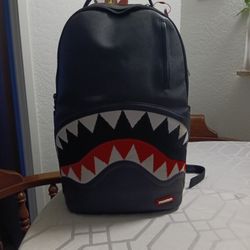 Sprayground shark-mouth knitted backpack
