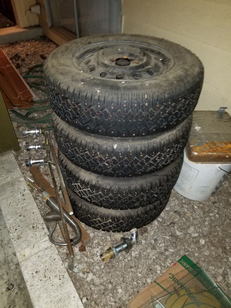 1999 Subaru studded tires with rims