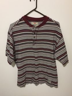 One Levi’s and one Docker shirt, size large.