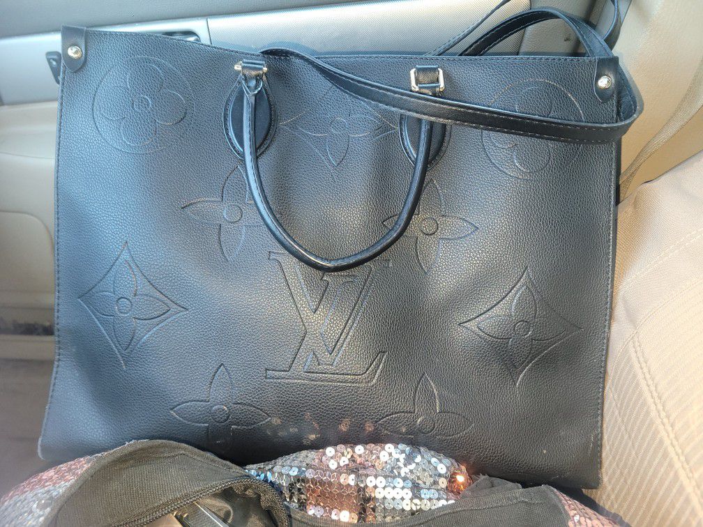 Louis Vuitton  On The Go Bag