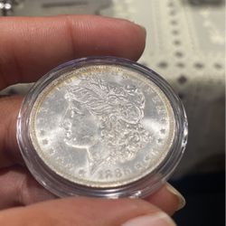 1885 O Morgan silver dollar higher grade