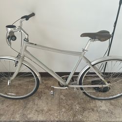 Felt cafe 3. Three speed, cruising bike with oversized, kryptonite block, and bike pump.