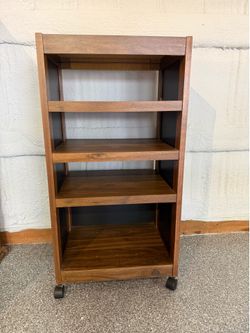 Stereo stand on wheels