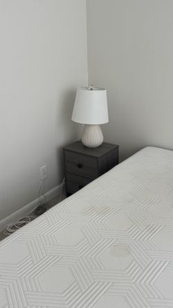 King sized bed with nightstands and lamps