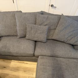 Grey Couch And Ottoman 