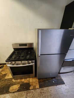Whirlpool refrigerator30 inches wide and Samsung gas stove