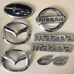3$ each Emblems