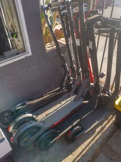 10 e scooters, $800 lot - Batteries, controller's, motors, spare wheels, solid rubber