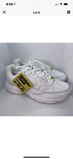 FILA Mens Memory Workshift Slip Resistant Sneaker #1SG30002-100 All White 8.5 US. Was a display model so the bottom of the shoes have a little dirt , 