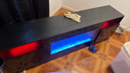 75 in TV TABLE WITH ELECTRIC AND HEATER