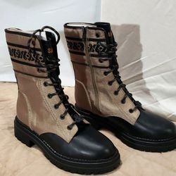 Sam & Libby Stella Combat Boots , size 8 heavy rubber traction soles, & design on ankle, sole and laces, booth zip up the inside, black lower and khak