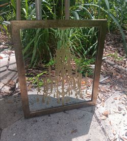 Gold Framed Mirror with Chandelier Design