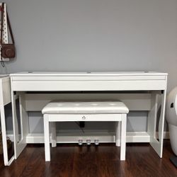 White Piano With Hidden Storage Bench